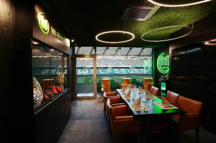 Stadium VIP lounge equipped with distributed audio, displays and AV control systems.